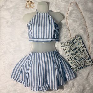 A two piece stripe outfit plus accessories